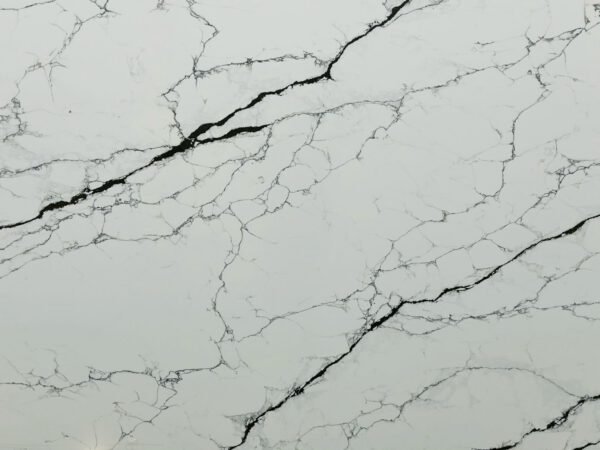Smyrna Olive  (Jumbo 138x78 Avg 74.75 sq.ft slab size)(white background and green olive bright lines)Builder Stone